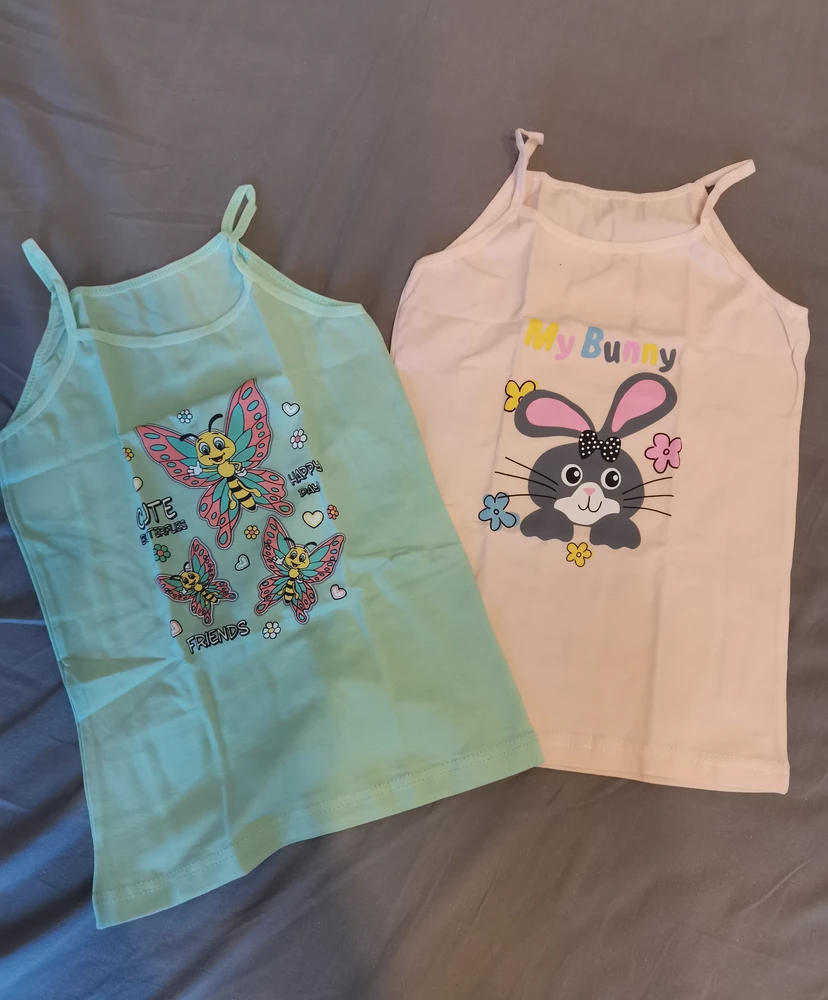 Прекрасные маечки, очень приятные к телу, качественный рисунок,  нежные  цвета. Главное дочке понравились.
